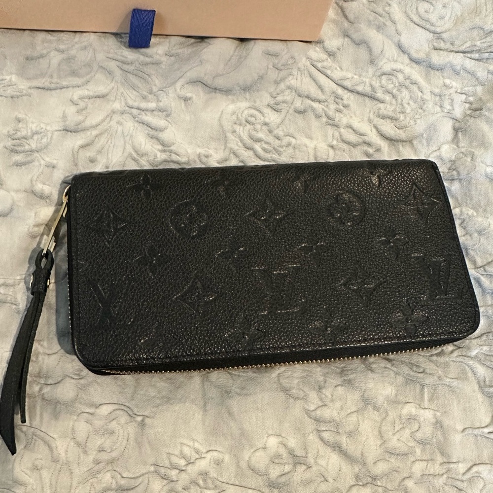 Authentic Louis Vuitton M61864 Black Empreinte Zippy Wallet